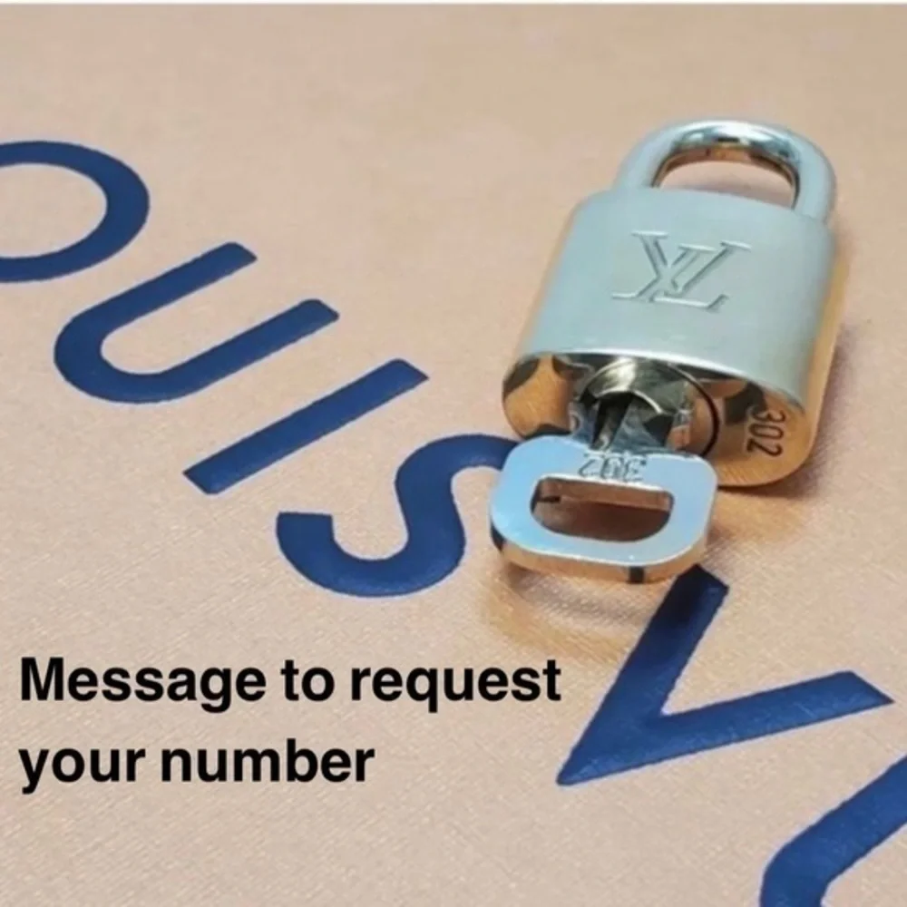 NEAR MINT AUTHENTIC Louis Vuitton lock and key set._2